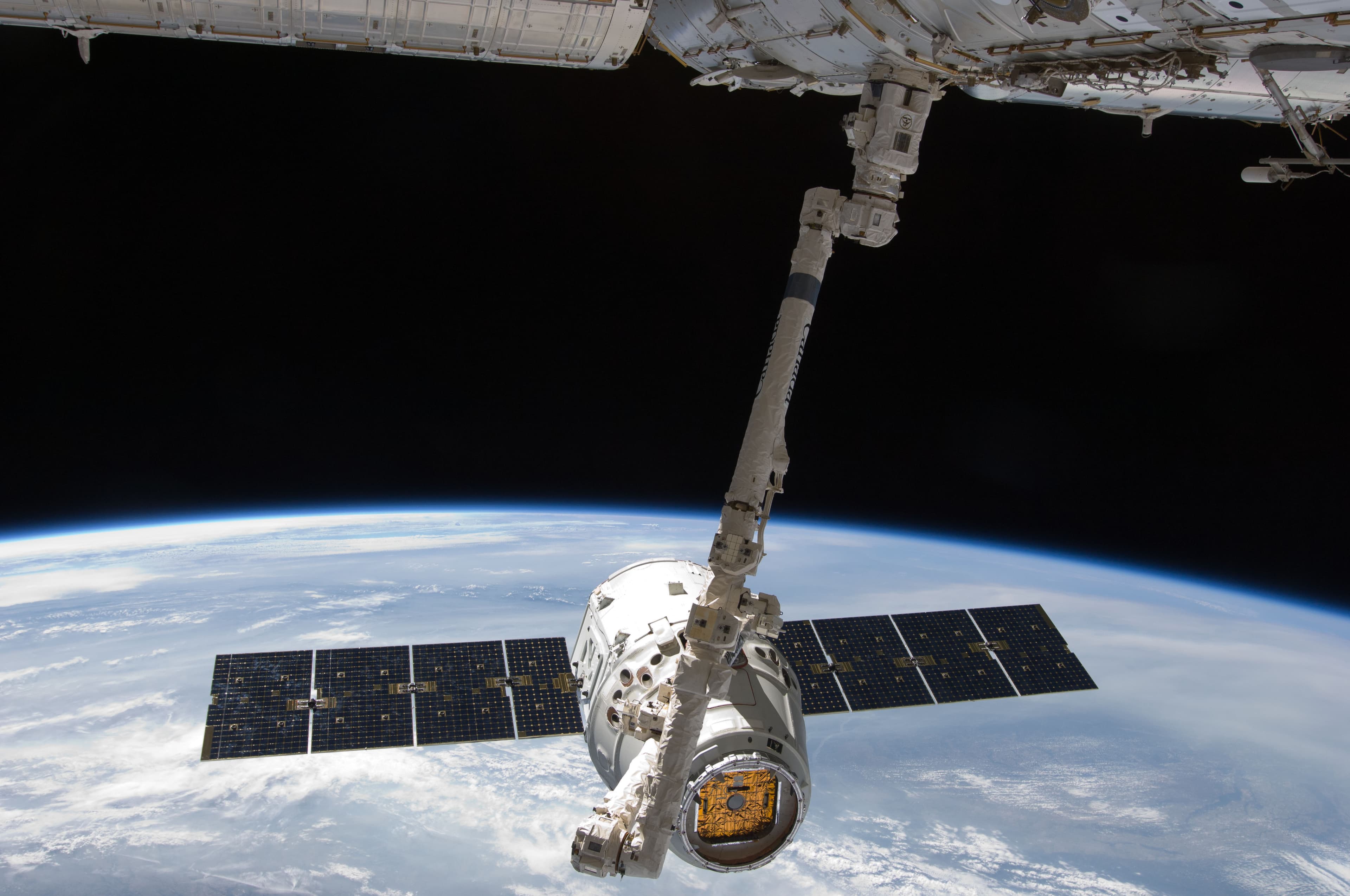 SpaceX Dragon cargo craft grappled by Canadarm2 at the ISS, May 2012