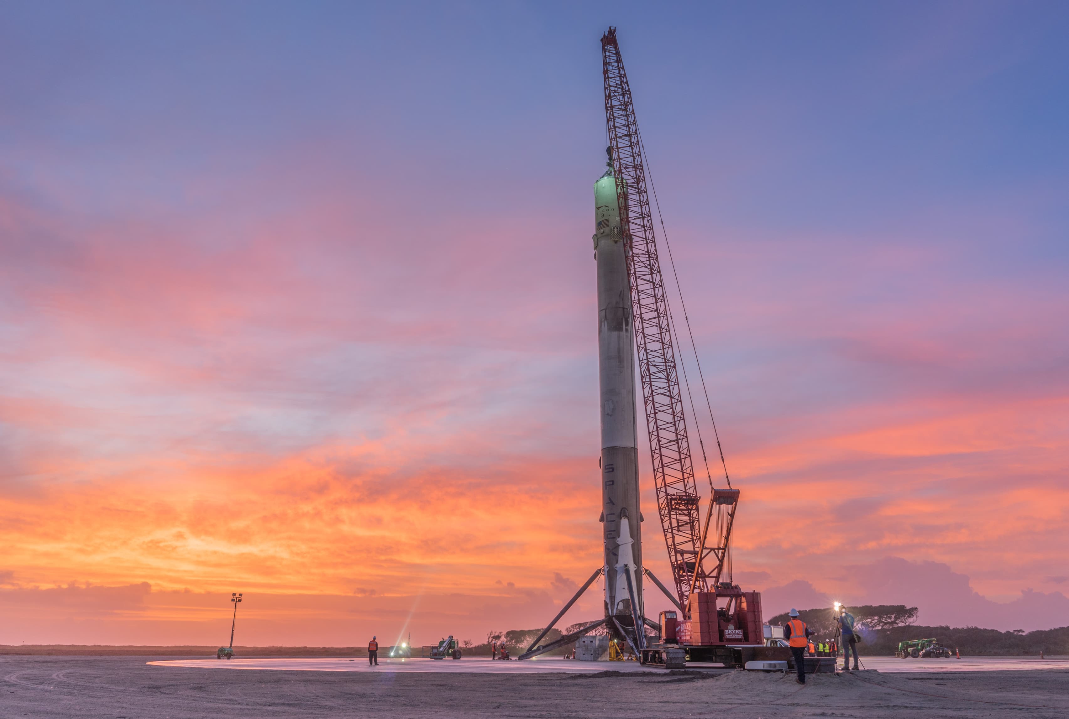 SpaceX Falcon 9 first stage standing at Landing Zone 1 after recovery